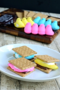Here are some awesome indoor smores. Place the bottom graham cracker , chocolate square, and a Peep in the microwave for not more than 15 seconds. The Peeps are soft after that and the chocolate is melted. Then just squish it all together with the top graham cracker. Photo courtesy of Eclectic Recipes.